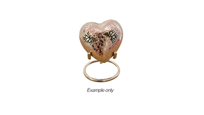 Silver Nickel Keepsake Heart Stand holding a decorative heart, showcasing its stable and stylish design for memorial or ornamental display purposes.